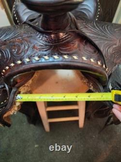 Older Floral Buckstitch Saddle