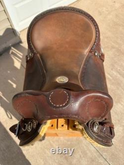 Slightly used 15 inch seat Clinton Anderson roughout western saddle by Martin