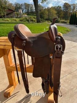 Slightly used 15 inch seat Clinton Anderson roughout western saddle by Martin