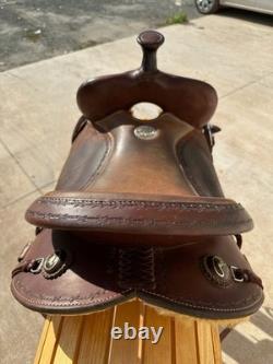 Slightly used 15 inch seat Clinton Anderson roughout western saddle by Martin