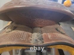 Super comfy leather Western trail saddle with stirrups included. Only ridden 3x
