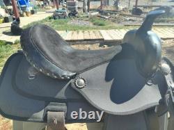 Synthetic western trail saddle, used, lightweight, see pics