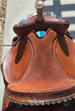 Traditional Western Style Tooled Saddle with Rawhide Horn Decorative Conchos
