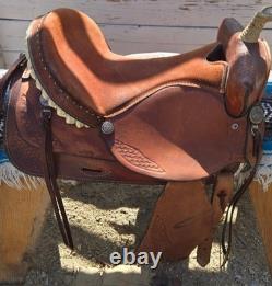 Traditional Western Style Tooled Saddle with Rawhide Horn Decorative Conchos