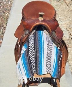 Traditional Western Style Tooled Saddle with Rawhide Horn Decorative Conchos