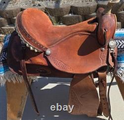 Traditional Western Style Tooled Saddle with Rawhide Horn Decorative Conchos