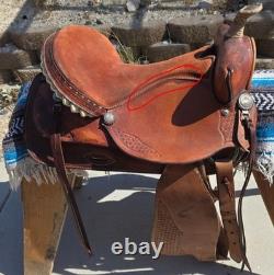 Traditional Western Style Tooled Saddle with Rawhide Horn Decorative Conchos