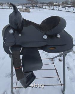 Used 12 black leather youth / pony western saddle withsuede seat