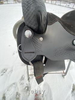 Used 12 black leather youth / pony western saddle withsuede seat