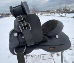 Used 12 black leather youth / pony western saddle withsuede seat