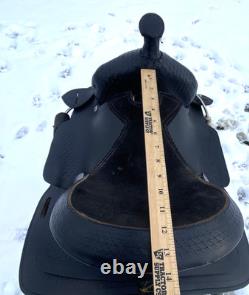 Used 12 black leather youth / pony western saddle withsuede seat