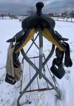 Used 12 black leather youth / pony western saddle withsuede seat