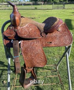 Used 13 Action Co. Tooled youth/child's western saddle withsuede seat US made
