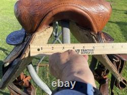 Used 13 Action Co. Tooled youth/child's western saddle withsuede seat US made