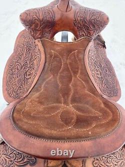 Used 13 brown tooled leather youth/child's western saddle withsuede seat US made