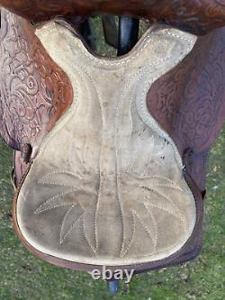 Used 13 brown tooled leather youth/child's western saddle withsuede seat US made