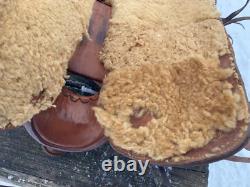 Used 13 brown tooled leather youth/child's western saddle withsuede seat US made