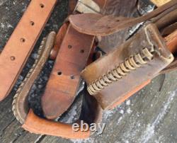 Used 13 brown tooled leather youth/child's western saddle withsuede seat US made