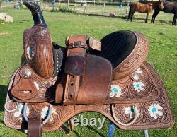 Used 13 youth Western barrel saddle withhand painted flowers