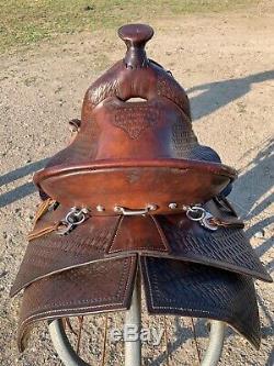 Used 14 Skot Line hard seat high back Western mule saddle US made