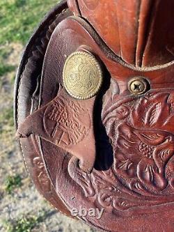 Used 15.5 tooled / silver laced Western saddle US made The American