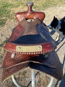 Used 15.5 tooled / silver laced Western saddle US made The American