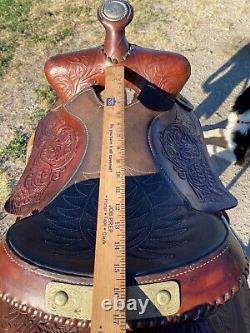 Used 15.5 tooled / silver laced Western saddle US made The American