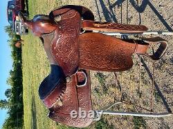 Used 15.5 tooled / silver laced Western saddle US made The American