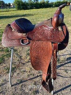 Used 15.5 tooled / silver laced Western saddle US made The American