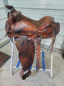 Used 15 Brown Color Roping Saddle with Bear trap Pommel Made in the USA