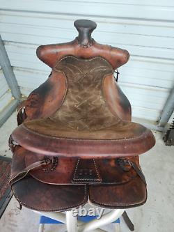 Used 15 Brown Color Roping Saddle with Bear trap Pommel Made in the USA