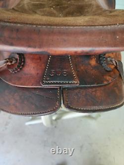 Used 15 Brown Color Roping Saddle with Bear trap Pommel Made in the USA