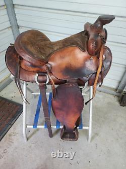 Used 15 Brown Color Roping Saddle with Bear trap Pommel Made in the USA