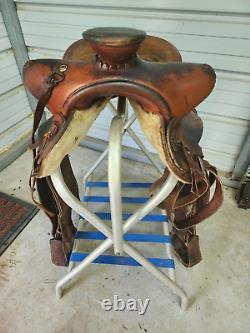 Used 15 Brown Color Roping Saddle with Bear trap Pommel Made in the USA