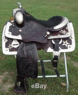Used 16.5 Western show saddle tooled dark oil leather withlots of silver