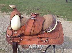 Used 16 Western pleasure /trail saddle basket stamped leather semi bars