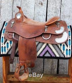 Used- Bob's 16 reining saddle with padded seat and hand engraved silver