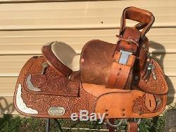 Used Circle Y 16 tooled Western show saddle withsiver for short adult or youth