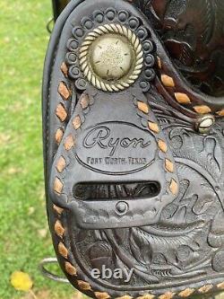 Used/Vintage 15 RYON buckstitched Western saddle withtooled cutting horses