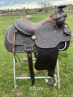 Used/Vintage 15 RYON buckstitched Western saddle withtooled cutting horses