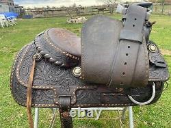 Used/Vintage 15 RYON buckstitched Western saddle withtooled cutting horses