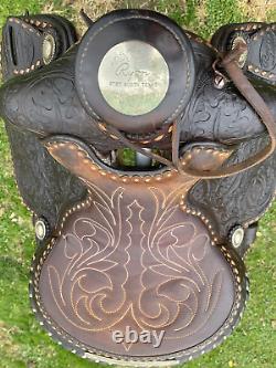 Used/Vintage 15 RYON buckstitched Western saddle withtooled cutting horses