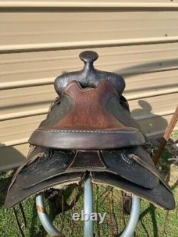 Used/Vintage 15 TexTan Western saddle withspiderweb tooling