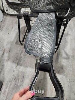 Used Western saddle 15 Black withsilver trim and breast collar to match