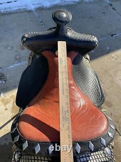 Used/vintage 15.5 black leather Western parade saddle withtapaderos, silver