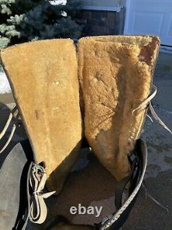 Used/vintage 15.5 black leather Western parade saddle withtapaderos, silver