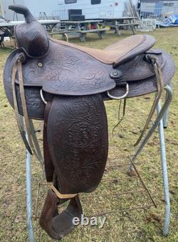 Used /vintage 15 tooled round skirt Western saddle for round withers US made