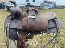 Used /vintage 15 tooled round skirt Western saddle for round withers US made