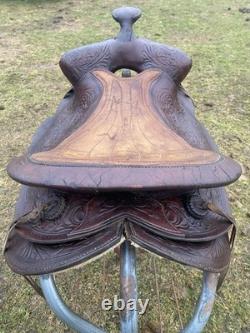 Used /vintage 15 tooled round skirt Western saddle for round withers US made