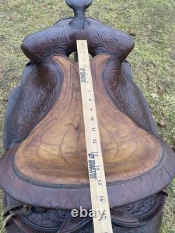 Used /vintage 15 tooled round skirt Western saddle for round withers US made